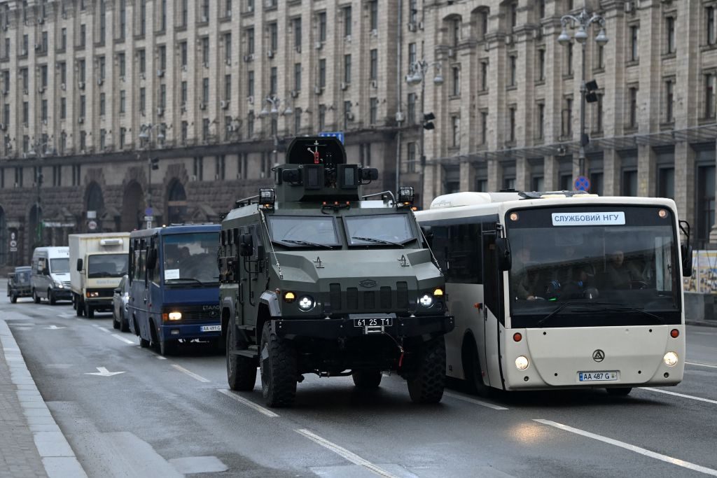 A Ukrainian military vehicle drives in central Kyiv on February 24, 2022.(DANIEL LEAL/AFP via Getty Images)