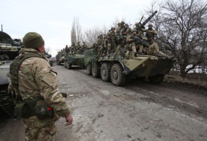 Ukrainian servicemen get ready to repel an attack in Ukraine's Lugansk region on Febr
