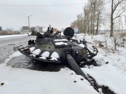 TOPSHOT - A fragment of a destroyed Russian tank is seen on the roadside on the outskirts