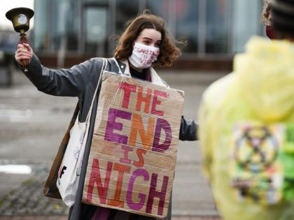 GLASGOW, SCOTLAND - NOVEMBER 13: Activist hold a demonstration marking the delayed COP26 UN climate negotiations on November 13, 2020 in Glasgow, Scotland. The 26th United Nations Climate Change conference would have taken place this month, but was delayed for a year due to the covid-19 pandemic. (Photo by Jeff …