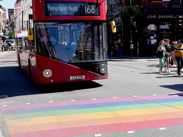LONDON,UNITED KINGDOM - JUNE 01: A bus travels over a rainbow crossing in Camden during UK Pride Month 2021 on June 01, 2021 in London, United Kingdom. June marks Pride month, it is a month dedicated to celebrating the LGBTQ+ communities all around the world. (Photo by Edward Smith/ Getty …
