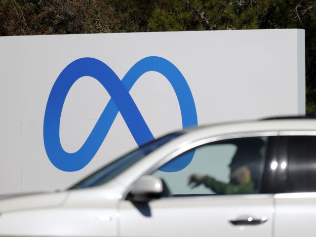 MENLO PARK, CALIFORNIA - OCTOBER 28: A car drives by a new logo and the name 'Meta' on the sign in front of Facebook headquarters on October 28, 2021 in Menlo Park, California. A new name and logo were unveiled at Facebook headquarters after a much anticipated name change for …