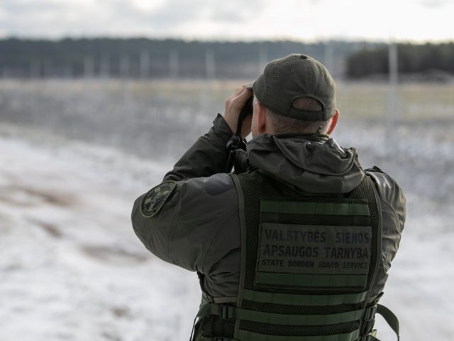 SVENDUBRE, LITHUANIA - NOVEMBER 30: Lithuanian State Border Guard patrolling near border with Belarus on November 30, 2021 in SVENDUBRE, Lithuania. European Union countries accuse the Belarusian government of creating a crisis by bringing thousands of migrants - mostly from the Middle East - to the country's border with Poland …