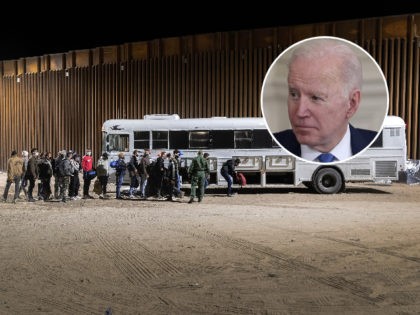 YUMA, ARIZONA - DECEMBER 08: U.S. Border Patrol agents load immigrants into a bus for transport to a detention facility on December 08, 2021 through the city of Yuma, Arizona. Immigration officials were overwhelmed processing thousands of new arrivals, with many families trying to reach U.S. soil before the court-ordered …
