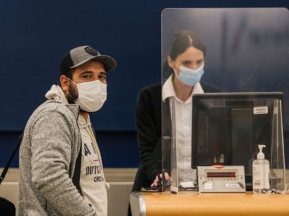 A person checks in for their departure flight at the George Bush Intercontinental Airport on January 13, 2022 in Houston, Texas. Due to the COVID-19 pandemic, Delta Airlines canceled thousands of flights and lost $408 million in the final quarter of 2021. Delta has predicted that it will suffer one …
