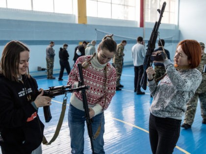 OBUKHIV, UKRAINE - FEBRUARY 06: Civilians participate in a beginners combat and survival training course run by instructors from the Ukraine Territorial Defence units at a school in a Obukhiv on February 06, 2022 in Kyiv, Ukraine. Across Ukraine, civilians are participating in such groups to receive basic combat, medical …