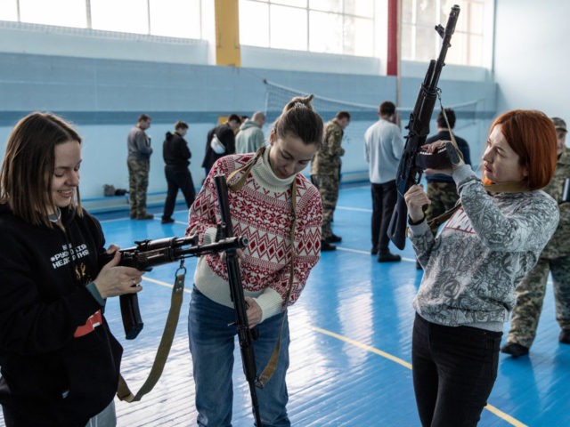 OBUKHIV, UKRAINE - FEBRUARY 06: Civilians participate in a beginners combat and survival