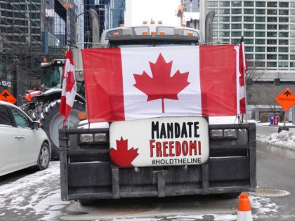 OTTAWA, ONTARIO - FEBRUARY 16: A truck participates in a blockade of downtown streets near the parliament building as a demonstration led by truck drivers protesting vaccine mandates continues on February 16, 2022 in Ottawa, Ontario, Canada Prime Minister Justin Trudeau has invoked the Emergencies Act for the first time …