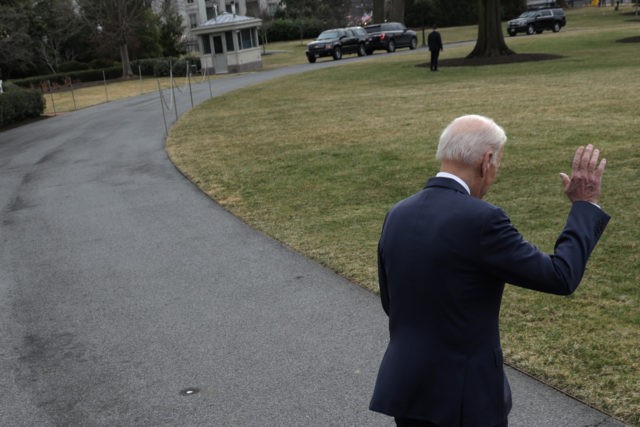 WASHINGTON, DC - FEBRUARY 17: U.S. President Joe Biden waves as he walks towards Marine One prior to a departure for Cleveland, Ohio from the White House on February 17, 2022 in Washington, DC. President Biden predicted the likelihood of a Russian invasion to Ukraine is high and “in a …