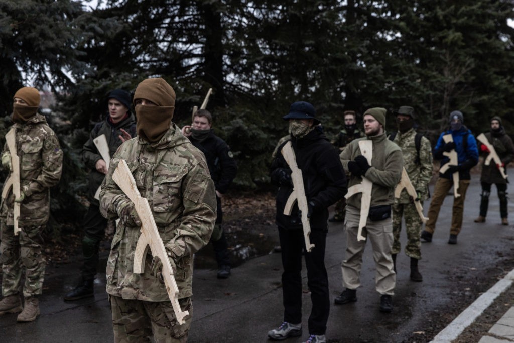 KYIV, UKRAINE - FEBRUARY 19: Civilians take part in a military training course conducted by a Christian Territorial Defence Unit on February 19, 2022 in Kyiv, Ukraine. Across Ukraine thousands of civilians are participating in such groups to receive basic combat and survival training as the fear of a Russian invasion continues to escalate. Ukrainian President Volodymyr Zelensky travelled to Munich to meet with U.S. Vice President Kamala Harris and other lawmakers at the 2022 Munich Security Conference despite warnings from U.S. officials not to leave the country, the trip comes after U.S. President Joe Biden warned Friday that he believes Russian forces intend to attack Ukraine "in the coming week" or sooner. (Photo by Chris McGrath/Getty Images)