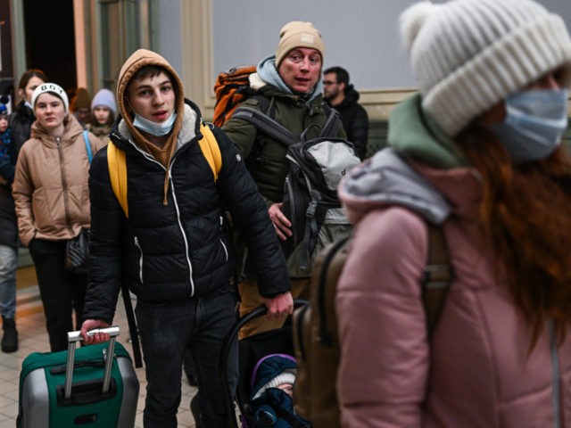 PRZEMYSL, POLAND - FEBRUARY 24: Ukrainian citizens take an overnight rest in a temporary s