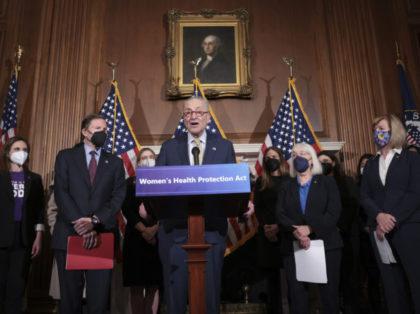 WASHINGTON, DC - FEBRUARY 28: U.S. Senate Majority Leader Chuck Schumer (C) speaks during a press conference at the U.S. Capitol February 28, 2022 in Washington, DC. Schumer and other members of the senate spoke out on “legislation that would guarantee equal access to abortion everywhere.” Also pictured are Sen. …
