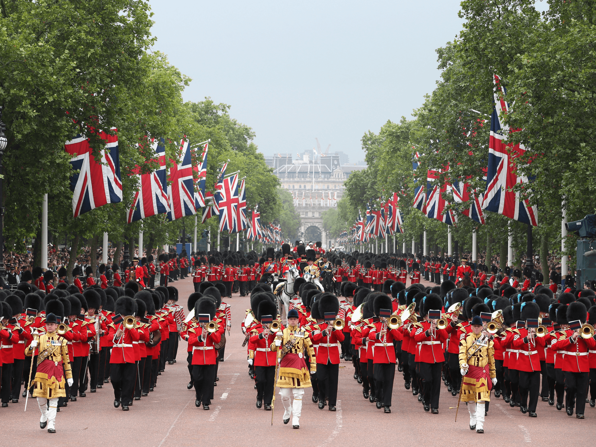 LONDON, ENGLAND - JUNE 14: Queen Elizabeth II and Prince Philip, Duke of Edinburgh process down the Mall during Trooping the Colour - Queen Elizabeth II