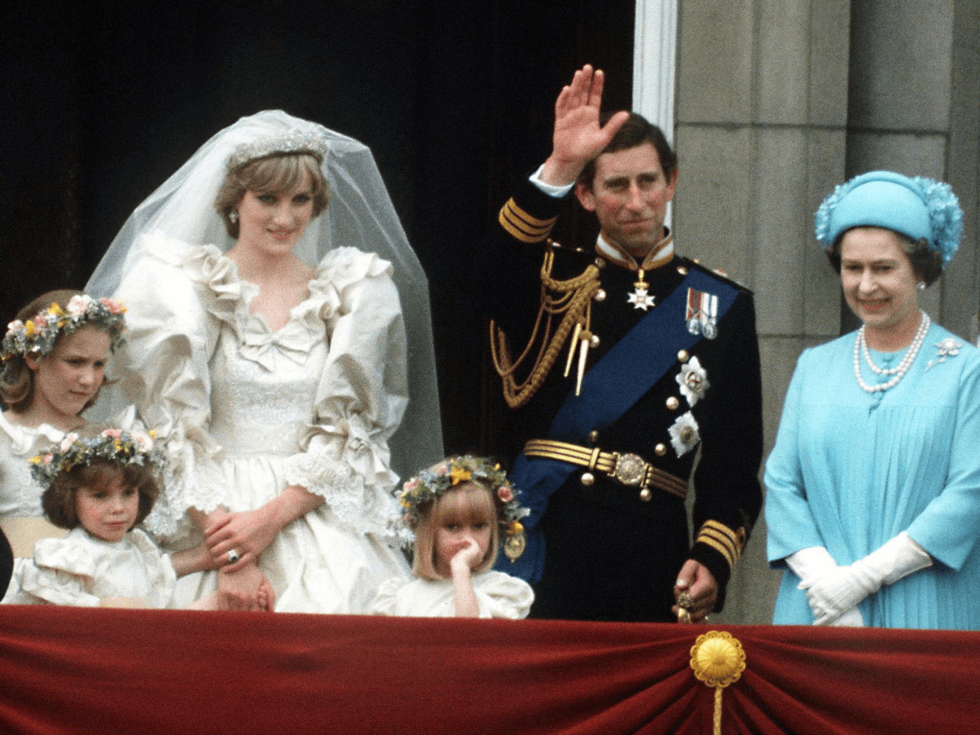 The Prince and Princess of Wales pose on the balcony of Buckingham Palace on their wedding day, with the Queen and some of the bridesmaids, 29th July 1981. (Photo by Terry Fincher/Princess Diana Archive/Getty Images)