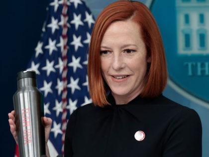 White House press secretary Jen Psaki shows a Team USA Beijing Olympics thermos during the daily press briefing at the White House on February 07, 2022 in Washington, DC. (Photo by Anna Moneymaker/Getty Images)
