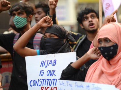 Activists from Students Federation of India (SFI) hold placards during a demonstration against the recent hijab ban in few of Karnataka's educational institutes, in Chennai on February 10, 2022. (Photo by Arun SANKAR / AFP) (Photo by ARUN SANKAR/AFP via Getty Images)