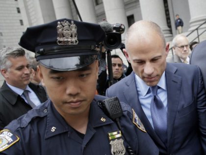 Attorney Michael Avenatti, center, leaves a courthouse in New York, Tuesday, May 28, 2019, after pleading not guilty to charges that he defrauded his most famous client, porn star Stormy Daniels.