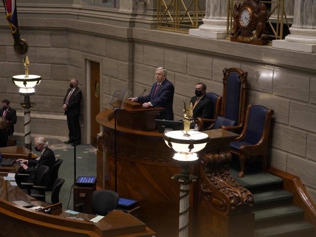 Missouri Gov. Mike Parson delivers the State of the State address Wednesday, Jan. 27, 2021, in Jefferson City, Mo. The speech is traditionally given in the House chamber but was moved to the smaller Senate chamber at the last minute due to concerns about the coronavirus.