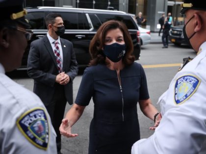 NEW YORK, NEW YORK - SEPTEMBER 08: New York Gov. Kathy Hochul (C) is greeted by Port Autho
