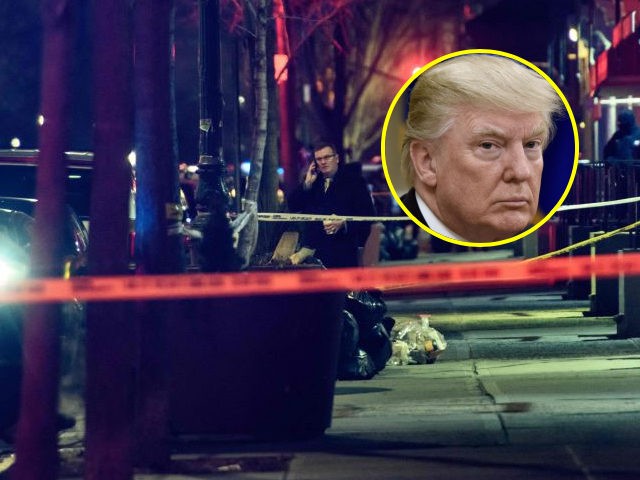 A general view shows the taped off area marking the scene of a shooting in Harlem, New York on January 22, 2022