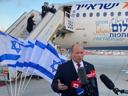 Israeli Prime Minister Naftali Bennett delivers a speech upon his departure to Bahrain on February 14, 2022 at Ben Gurion Airport near Tel Aviv. - Bennett was Monday set to fly to Bahrain on the first-ever official visit by an Israeli head of government to the Gulf state, his office …