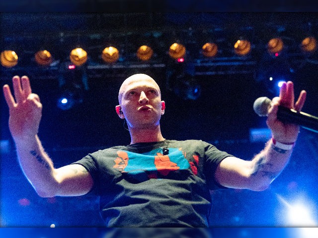 Rapper Oxxxymiron, whose real name is Miron Fyodorov, performs during a concert in support