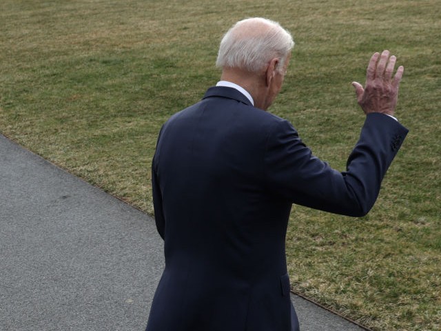 U.S. President Joe Biden waves as he walks towards Marine One prior to a departure for Cleveland, Ohio from the White House on February 17, 2022, in Washington, DC. (Photo by Alex Wong/Getty Images)
