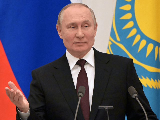 Russia's President Vladimir Putin attends a joint press conference with Kazakhstan's President following their talks at the Kremlin in Moscow on February 10, 2022.