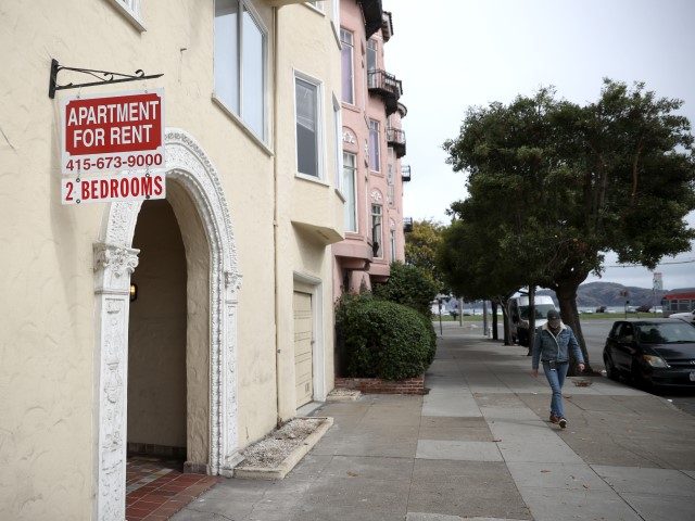 SAN FRANCISCO, CALIFORNIA - JUNE 02: A pedestrian walks by a "for rent" sign posted in fro