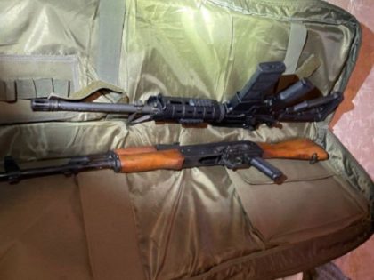 Agents seized two rifles at a human smuggling stash house near the Texas border with Mexic
