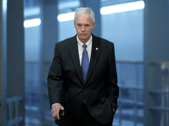 WASHINGTON, DC - MAY 27: Sen. Ron Johnson (R-WI) walks through the Senate subway on his way to a vote at the U.S. Capitol May 27, 2021 in Washington, DC. The mother of late Capitol Police Officer Brian Sicknick is on Capitol Hill today meeting with Republican lawmakers to urge …