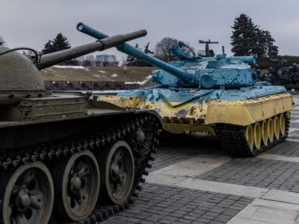 Children play on a tanks displayed at the Motherland Monument on the newly created "Unity Day" on February 16, 2022, in Kyiv, Ukraine. "Unity Day" was created by Ukraine's president this week, in response to news reports that February 16 would be the date Russian forces invade Ukraine after Russian …