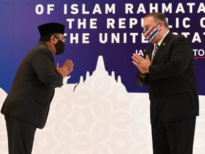 US Secretary of State Michael Pompeo (R) greets General Secretary of Nahdlatul Ulama, Yahya Cholil Staquf, (L) at the Nahdlatul Ulama in Jakarta on October 29, 2020.