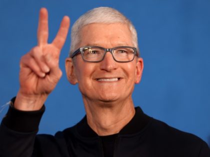 Tim "Apple" Cook Flashes V for Victory