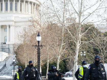 US Capitol Police patrol outside the US Capitol in Washington, DC, January 6, 2022, on the