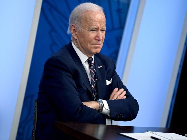 US President Joe Biden listens during a virtual meeting on securing critical mineral supply chains in the South Court Auditorium near the White House in Washington, DC, on February 22, 2022.