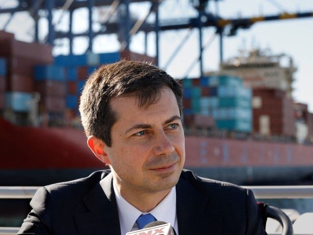 U.S. Department of Transportation Secretary Pete Buttigieg speaks to the media after touring the ports of Los Angeles and Long Beach in Long Beach, California, on January 11, 2022.