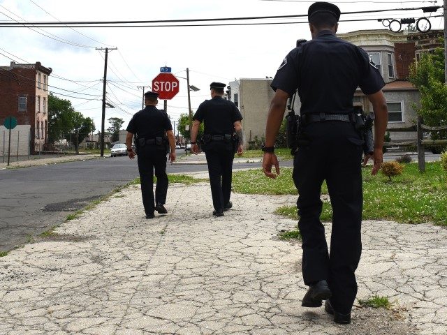 Camden County Police Department officers are seen on foot patrol in Camden, New Jersey, on