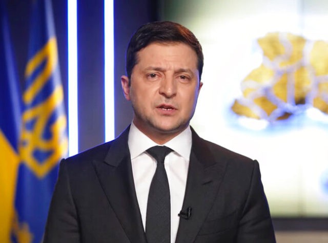 In this handout photo taken from video provided by the Ukrainian Presidential Press Office, Ukrainian President Volodymyr Zelenskyy addresses the nation in Kyiv, Ukraine, Thursday, Feb. 24, 2022. Zelenskyy declared martial law, saying Russia has targeted Ukraine's military infrastructure. He urged Ukrainians to stay home and not to panic. (Ukrainian …