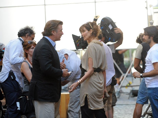 US actor Alec Baldwin (L) listens to US actress and model Carol Alt at Piazza della Pace (