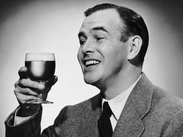 UNITED STATES - CIRCA 1950s: Man with beer in glass. (Photo by George Marks/Retrofile/Gett