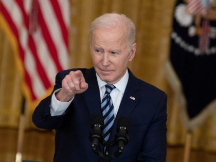 US President Joe Biden takes a question as he addresses the Russian invasion of Ukraine, from the East Room of the White House on February 24, 2022, in Washington, DC. - Biden announced "devastating" Western sanctions against Russia on Thursday. After a virtual, closed-door meeting, the G7 democracies said they …