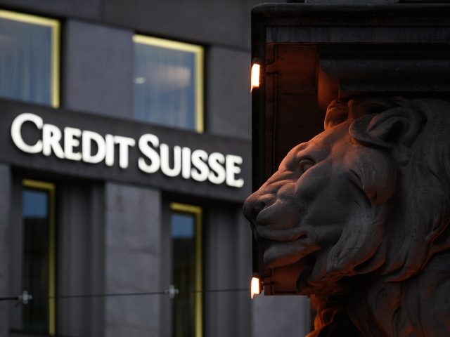 This photograph taken on November 4, 2020 shows a sign of Switzerland's second largest bank Credit Suisse on a branch's building in downtown Geneva. (Photo by FABRICE COFFRINI/AFP via Getty Images)