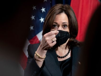 US Vice President Kamala Harris gesticulates as she speaks to members of the media at her