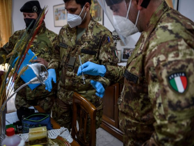 ISERNIA, ITALY - MARCH 28: The mobile health team of Italian Army prepares the Pfizer/BioN