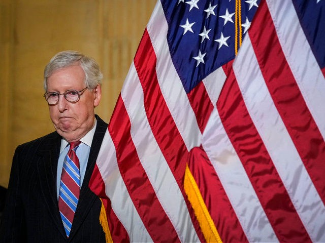 WASHINGTON, DC - FEBRUARY 8: Senate Minority Leader Mitch McConnell (R-KY) arrives to speak to reporters following a lunch meeting with Senate Republicans on Capitol Hill on February 8, 2022 in Washington, DC. McConnell answered a range of questions, including commenting about the Republican National Committee (RNC) censuring Rep. Adam …