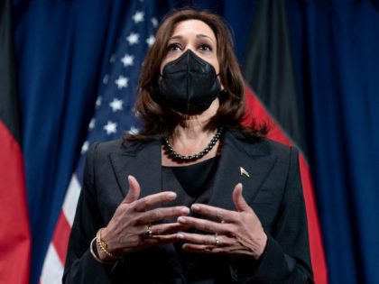 US Vice President Kamala Harris speaks to members of the media at her hotel after attendin