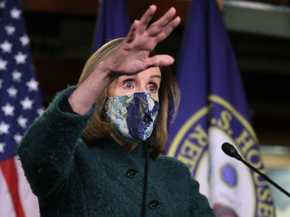 WASHINGTON, DC - JANUARY 28: Wearing a face mask to reduce the risk posed by the novel coronavirus pandemic, Speaker of the House Nancy Pelosi (D-CA) holds her weekly news conference in the U.S. Capitol Visitors Center January 28, 2021 in Washington, DC. When asked about what she means when …