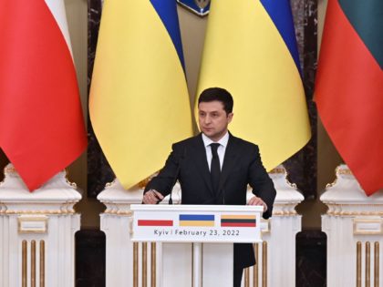 Ukrainian President Volodymyr Zelensky (C) and his counterparts from Lithuania Gitanas Nauseda (R) and Poland Andrzej Duda (L) hold a press conference following their talks in Kyiv on February 23, 2022. - The Ukrainian president on February 23 demanded "immediate" security guarantees from the West and Moscow aimed at averting …