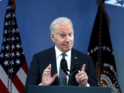 WASHINGTON, DC - FEBRUARY 15: U.S. President Joe Biden gestures as he speaks at the National Association of Counties legislative conference at the Washington Hilton Hotel on February 15, 2022 in Washington, DC. 1,500 elected and appointed county officials from across the country gathered for the hybrid event to hear …